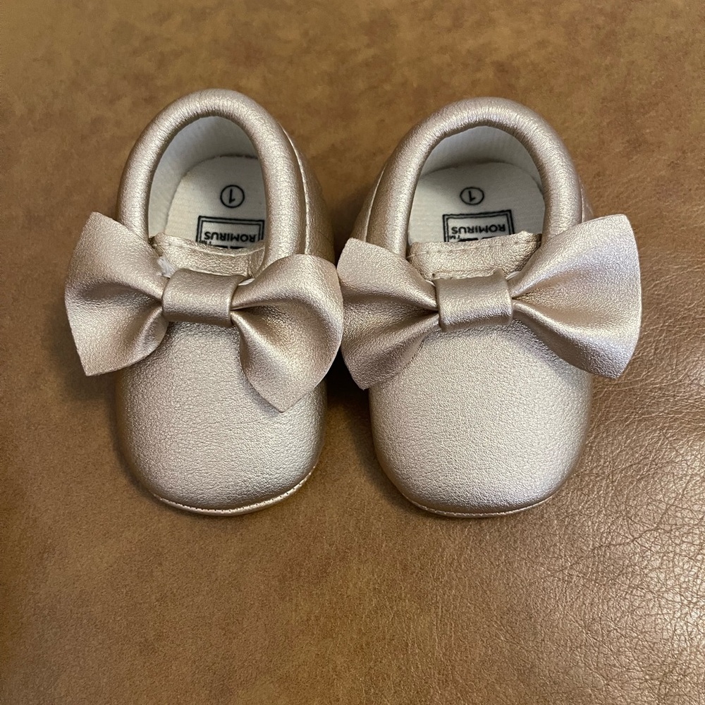 Gold baby moccasins